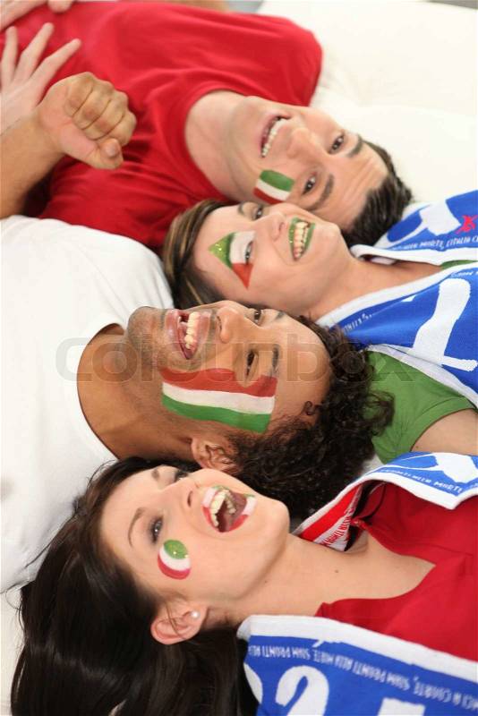 Four Italian soccer fans, stock photo