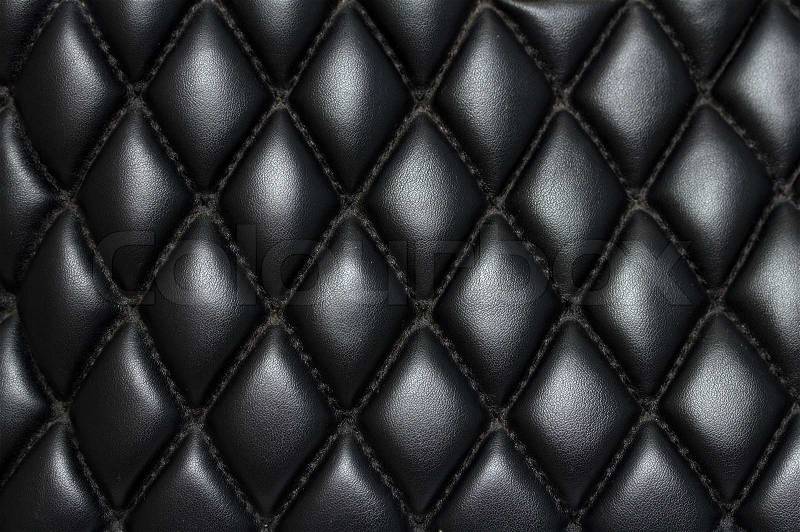 Black quilted leather background, stock photo