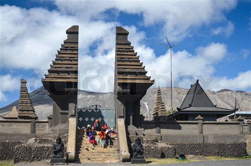 JAVA,INDONESIA-JULY 23:Indonesia people stand in Pura Luhur Poten at Mount Bromo on JULY 23,2013 in Java , Indonesia This temple is only one Hindu temple near the Bromo crater, stock photo