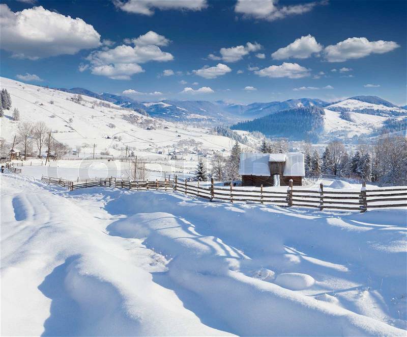 Sunny landscape in the mountain village. Winter morning. Iltsi village, Carpathian , Ukraine, Europe, stock photo