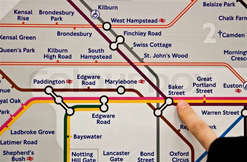 Finger pointing to Baker Street Underground station in London, United Kingdom direction for Madame Tussauds, stock photo