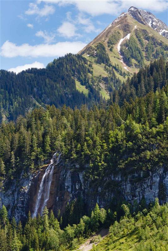 Summer Alps mountain view with waterfall Vorarlberg, Austria, stock photo
