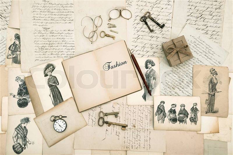 Antique accessories, old letters and fashion drawings from 1911. vintage nostalgic background, stock photo
