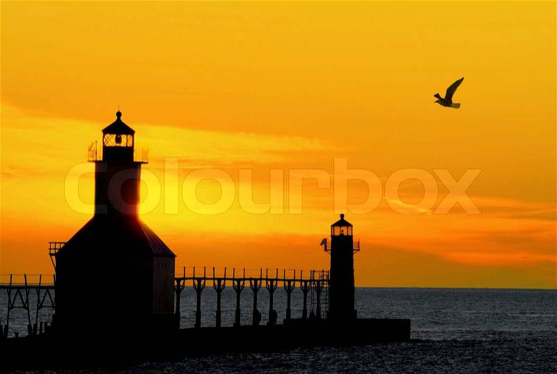 St. Joseph North Pier Lighthouse in St. Joseph, Michigan at sunset, stock photo