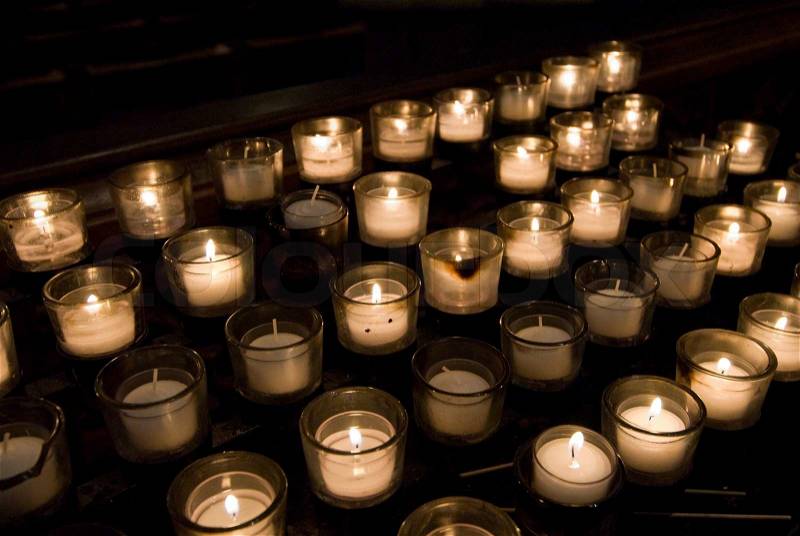 Prayer candles in a church, stock photo