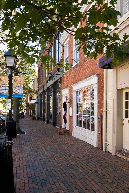 Typical small historic downtown main street. This could be any small town U.S.A. Old buildings turned into small businesses, retail shops and cafe\'s. , stock photo