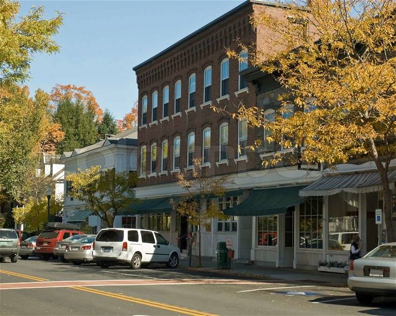 Typical New England or Midwest downtown main street. Could re3ally be qany small town U.S.A. Old brick buildings turned into small businesses, stock photo