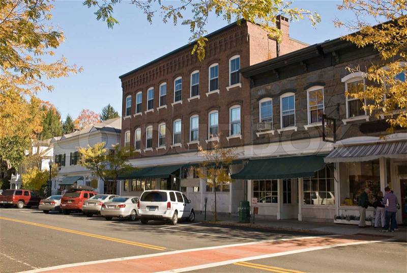 Typical New England or Midwest downtown main street. Could really be any small town U.S.A. Old brick buildings turned into small businesses, stock photo