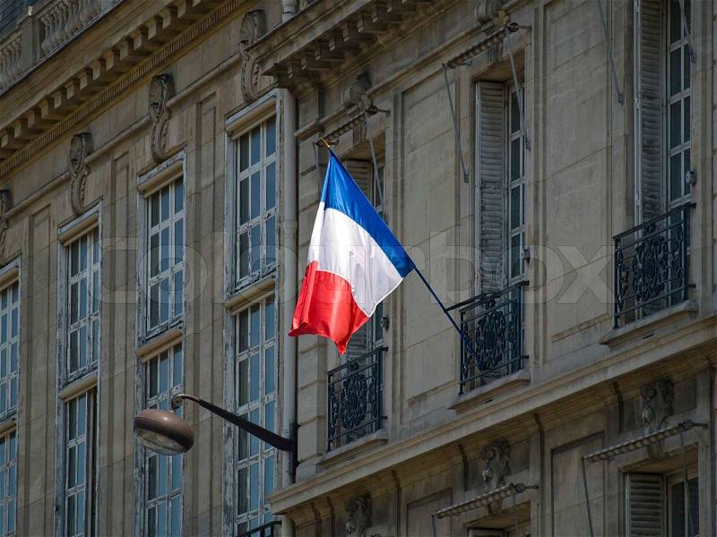 French flag in a Paris building, stock photo