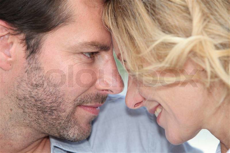 Couple facing each other, stock photo