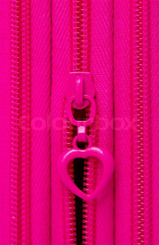 Locking zipper on a purple background, stock photo
