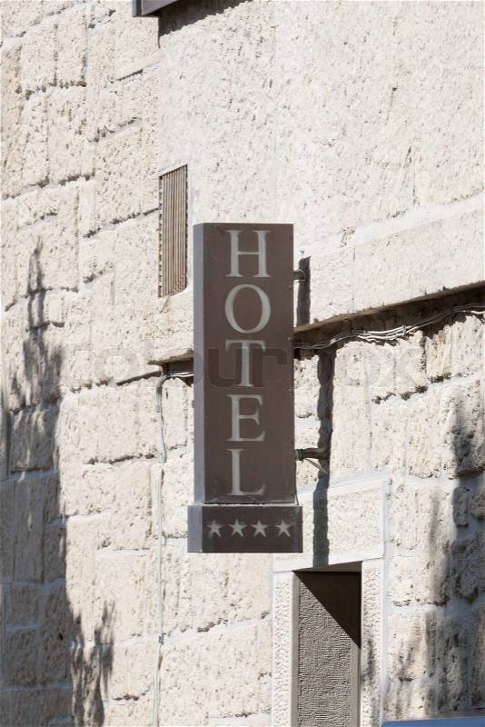 Hotel sign on the wall, stock photo