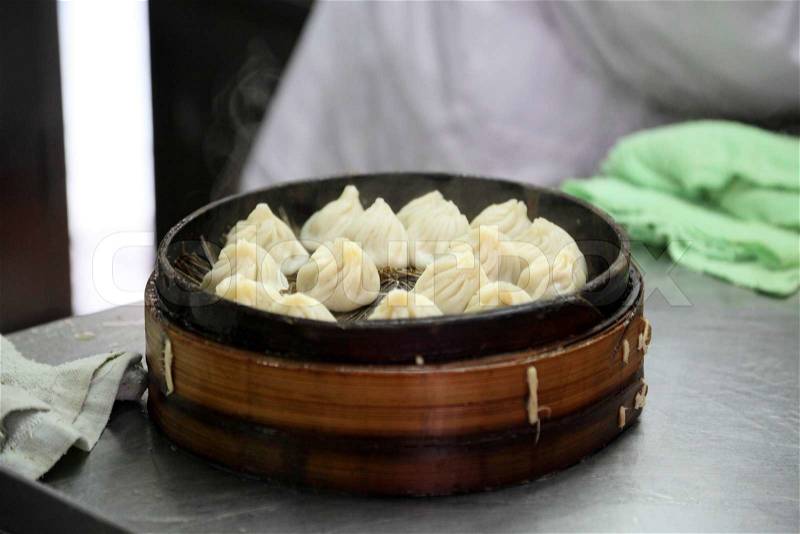 Dim sum dumplings in a restaurant in Shanghai, China, stock photo