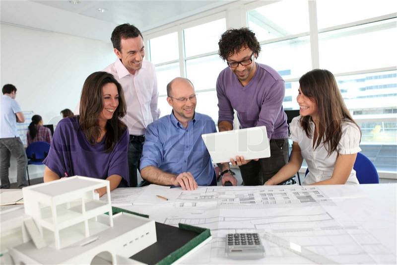 8065695-people-working-in-an-architect-s-office.jpg
