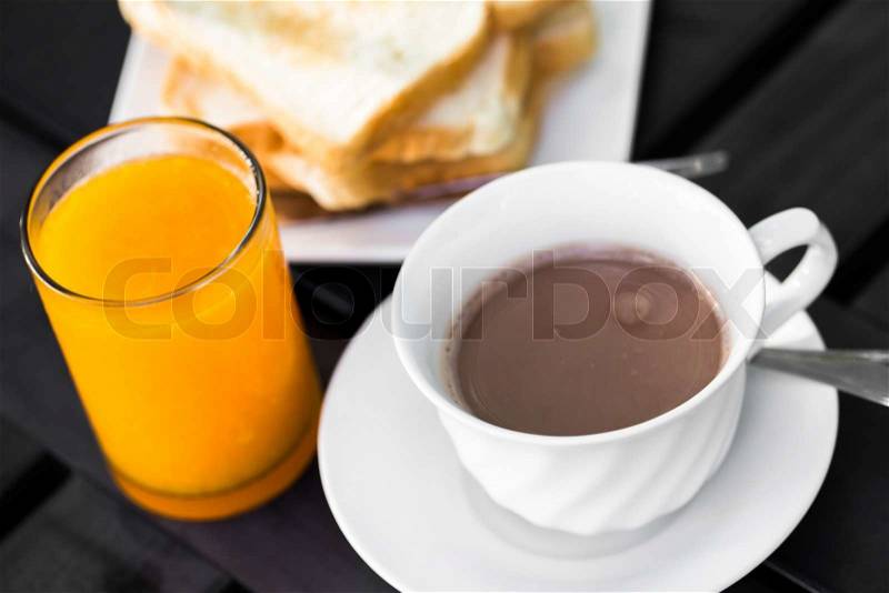 Breakfast with toast, coffee and orange juice, stock photo