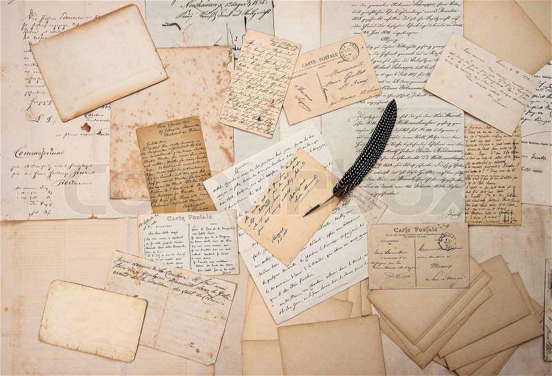 Old letters, handwritings, vintage postcards and antique feather pen. nostalgic sentimental background. ephemera, stock photo