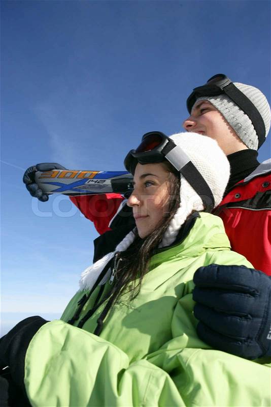 Teenage ski couple, stock photo