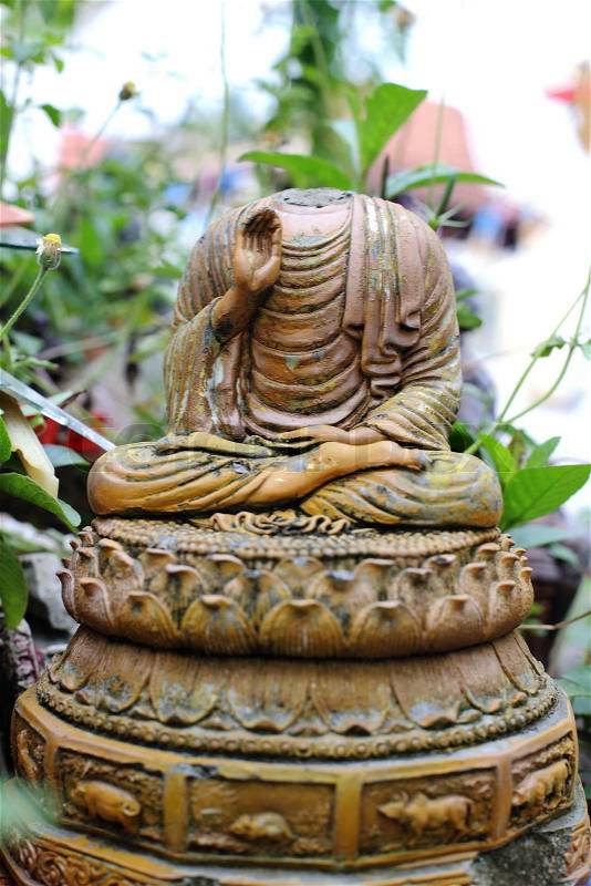 Ancient Buddha image in nature, stock photo