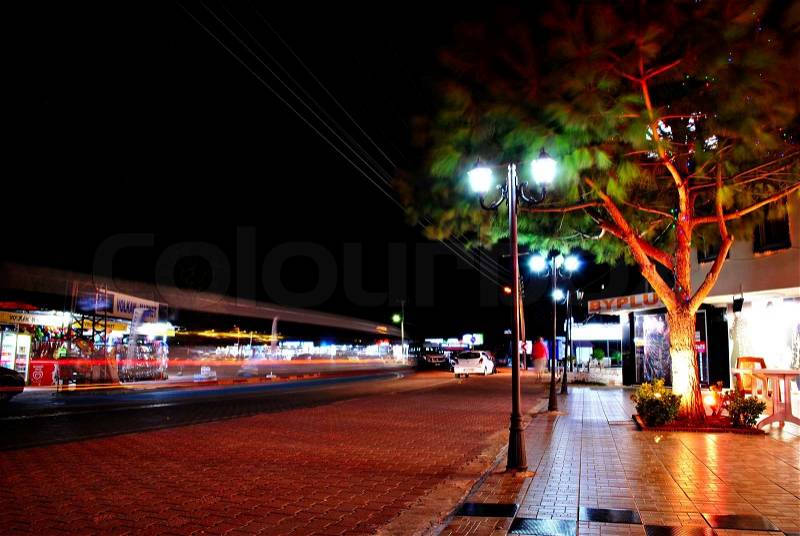 Night view of the street with shops in Beldibi, Kemer, Turkey, stock photo
