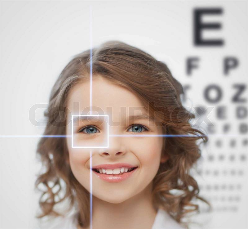 Health, vision, medicine, laser correction, happy people concept - smiling pre-teen girl with optometric table or eyesight testing board, stock photo