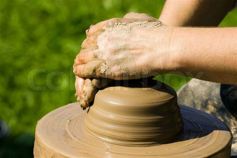 Potters hands, stock photo