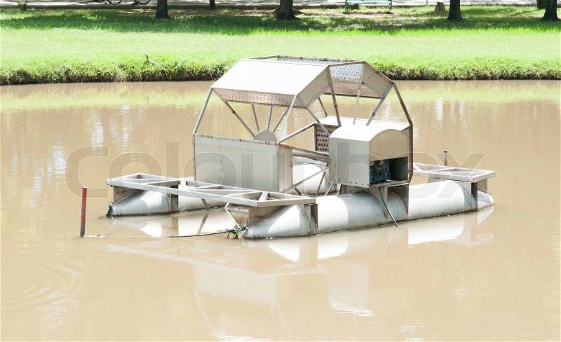 The Chaipattana Low Speed Surface Aerator Model RX-2 designed and developed by his Majesty the King Bhumibol Adulyadej of Thailand, Thia one in a small lake in Jatujak park in Bangkok, Thailand, stock photo
