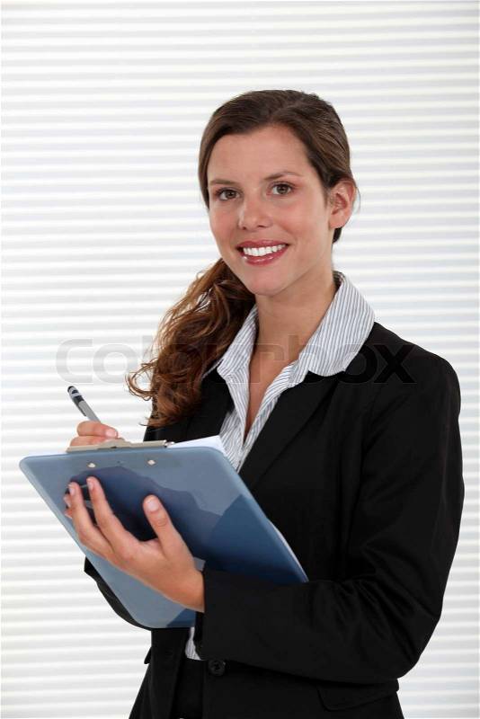 Office worker with a clipboard, stock photo