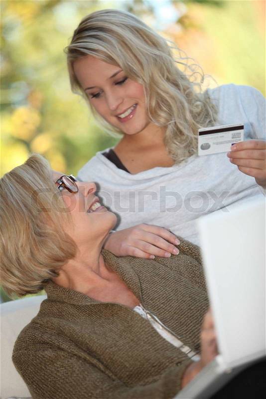 Help older people to buy online, stock photo