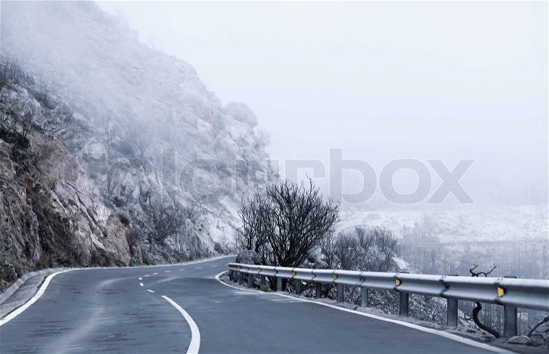 Winter Foggy Winding Road in Tenerife , stock photo