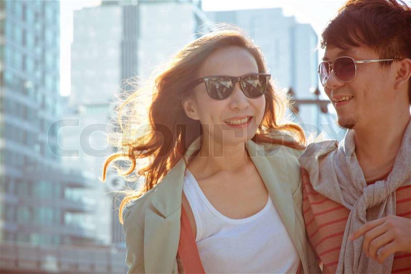 Dating young couple in love facing each other, stock photo