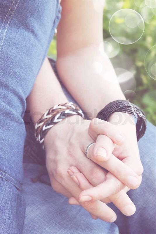 Holding hands, close-up, stock photo