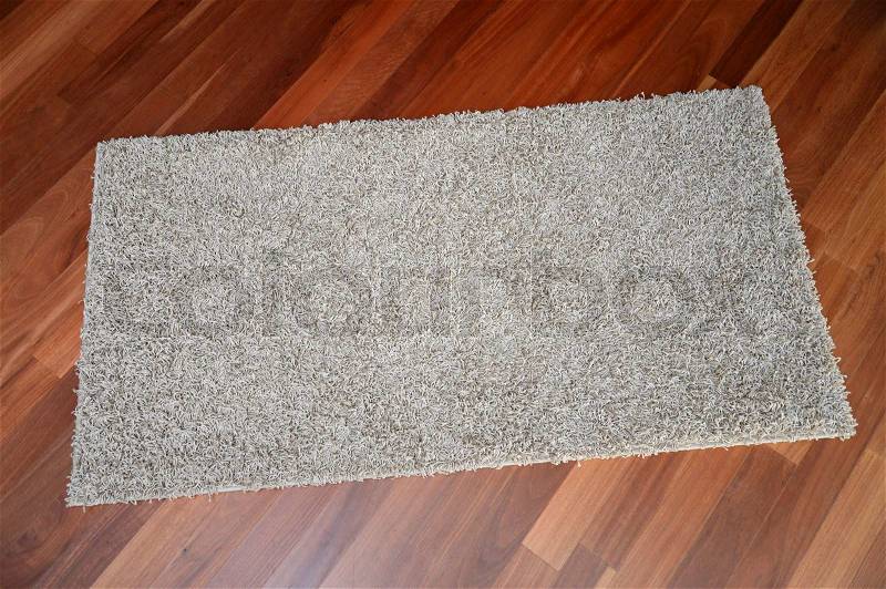 A floor rug isolated on a plain background, stock photo