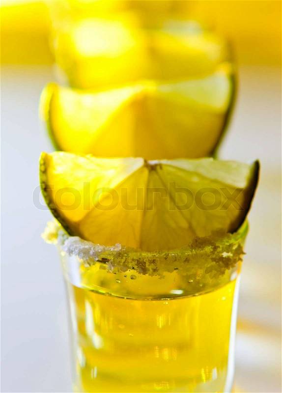 Tequila , lime and salt , macro shot , focus on foreground, stock photo