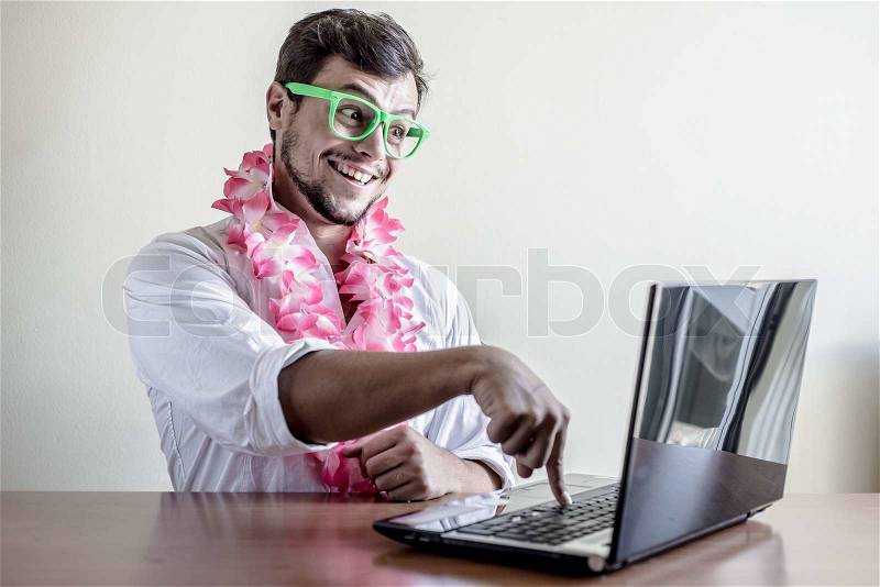 Young man travel search destination using notebook on the table, stock photo