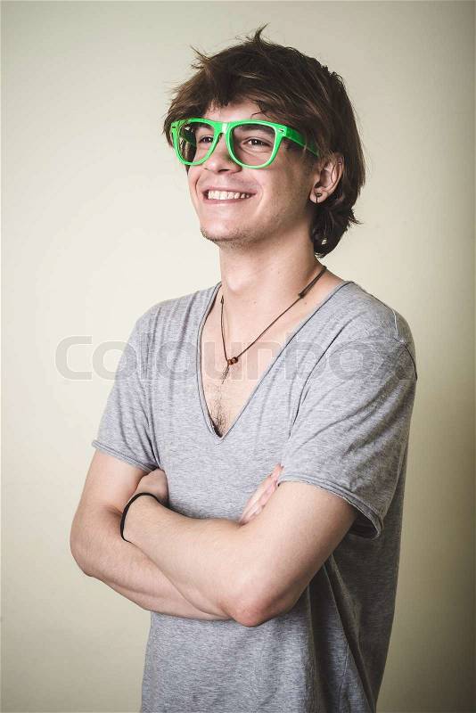 Stylish young blonde hipster man on white background, stock photo