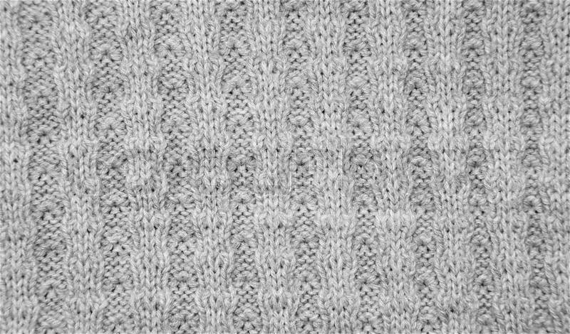 Background of gray knitted fabrics. texture, stock photo