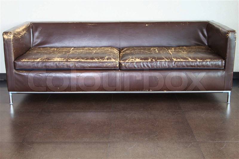 The old brown sofa set in the living room, stock photo