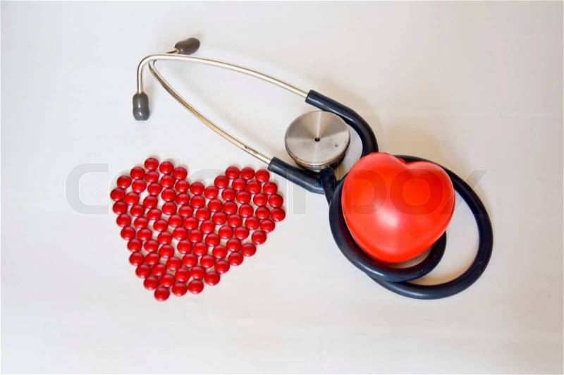 Red pill and red heart for living, stock photo