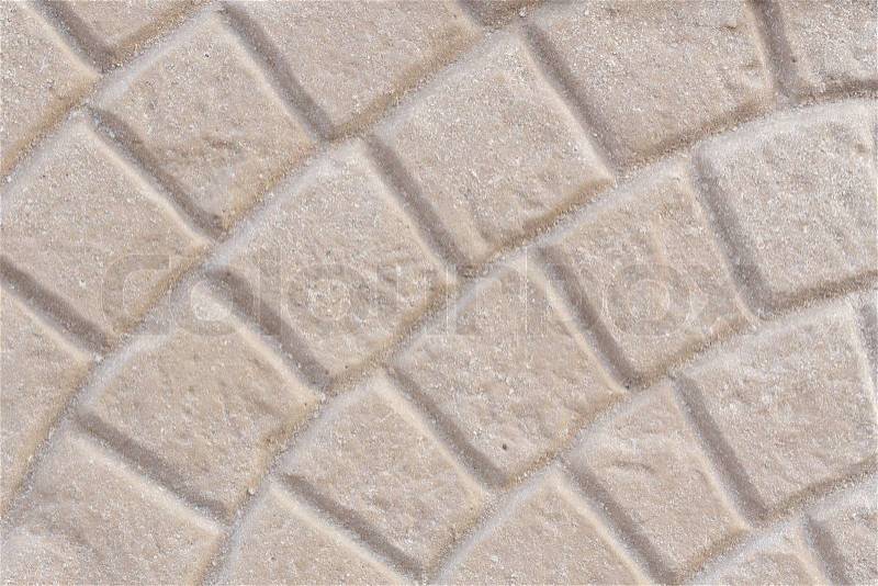 Beige tiled pavement texture background, stock photo