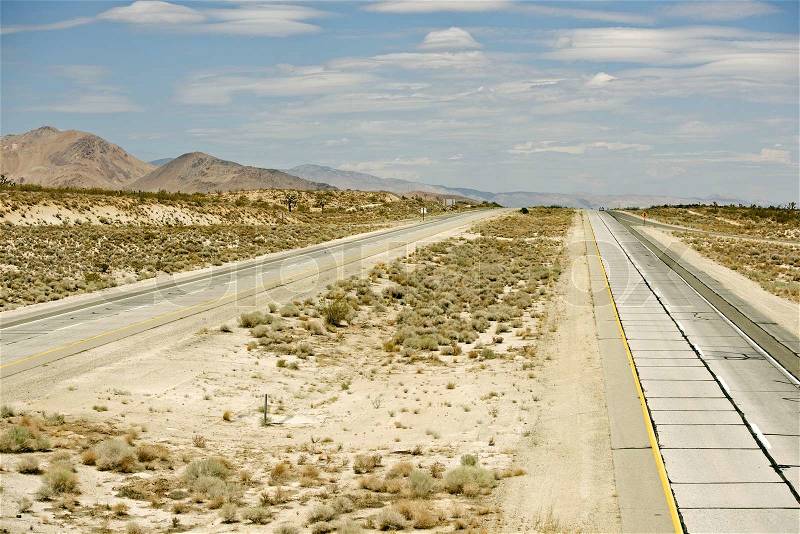 Pretty Empty Mojave Desert Highway in Southern California, USA, stock photo