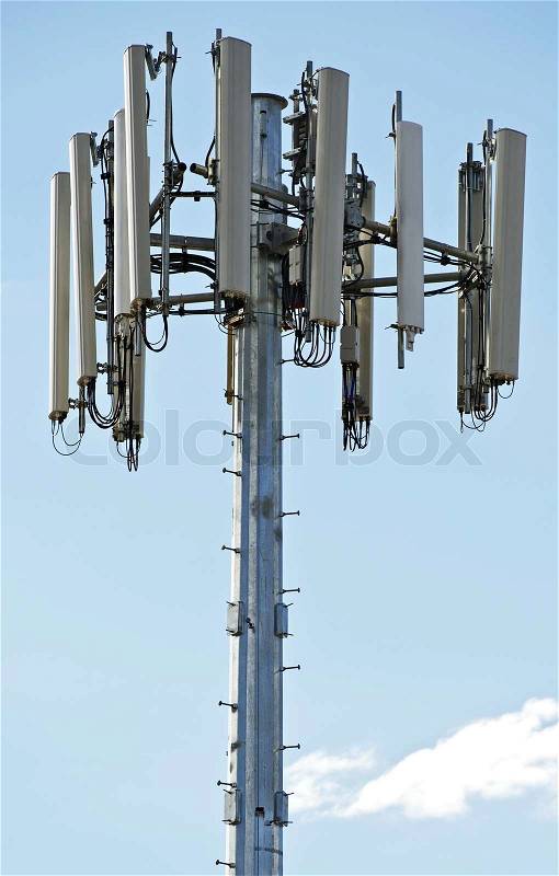 Modern Cellular Tower - Communication Tower on Blue Sky. Vertical Photography, stock photo