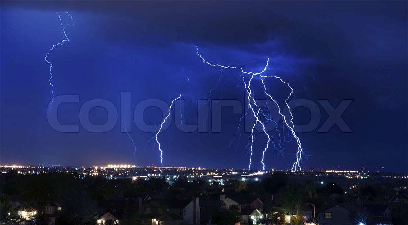 Lightning Storm Over South-West Colorado Springs, Colorado, USA. Overnight Heavy Thunderstorm - City, Storm Cloudscape and Few Lightnings. Powerful Nature Photo, stock photo