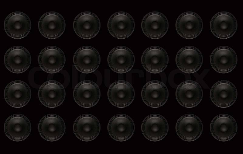 Subwoofers Wall. Black wall with Black Bass Speakers, stock photo