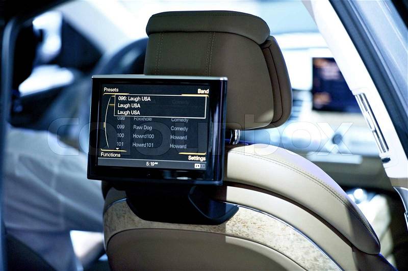 Back Seat Car Display - Car Audio-Video Theme. Back Seat Video Screen Closeup. Technology Photo Collection, stock photo