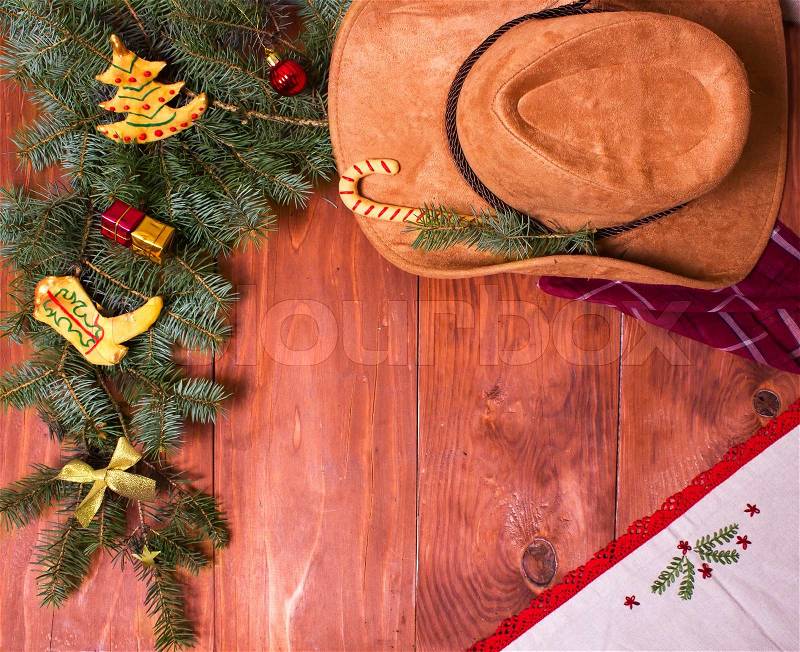 Cowboy Christmas wood background with holiday decorations for design, stock photo