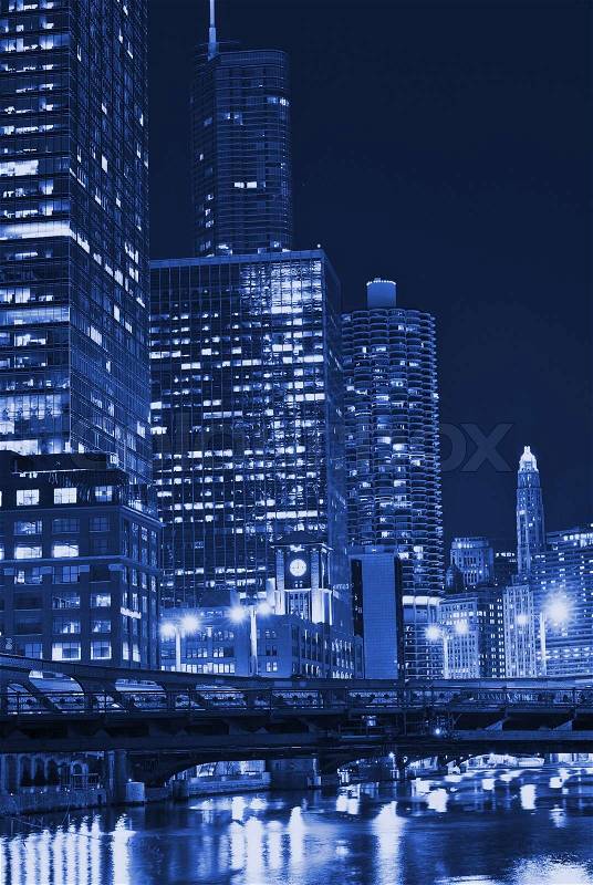 Chicago Night in Blue. Chicago, Illinois, USA. Chicago Downtown at Night - Duotone Blue Colors. Chicago Skyscrapers, stock photo
