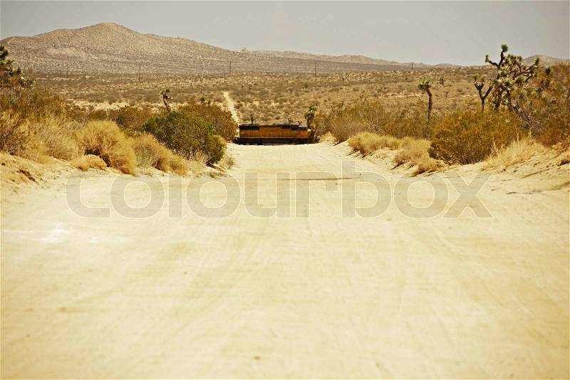 California Country Road - California Outback. Crossing Train. Mojave Desert, California USA, stock photo