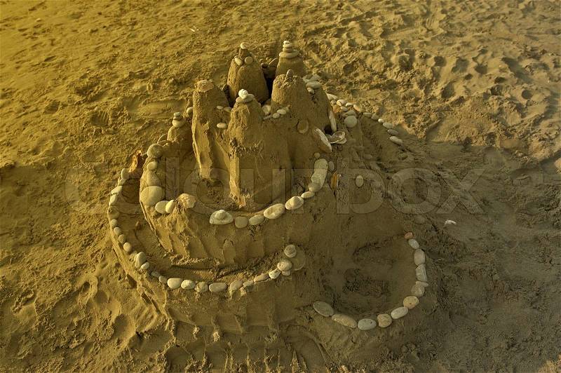 Sand Castle on the Beach. Sand Castle Closeup. Top-Side View. Summer Theme. , stock photo