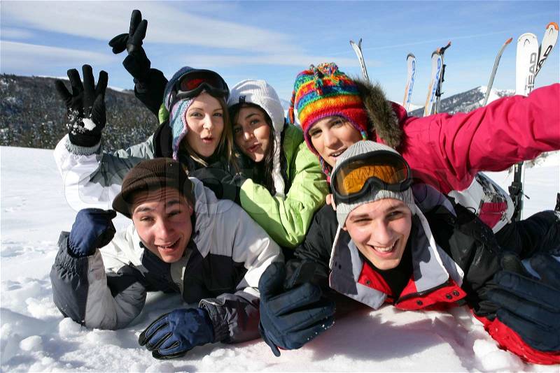 Group of friends on skiing holiday, stock photo