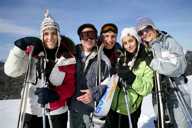 Group of friends with skis, stock photo